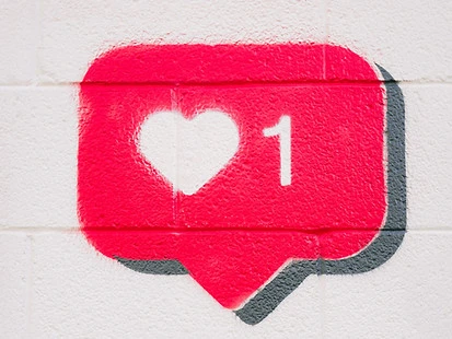 social media red like graffity on the wall